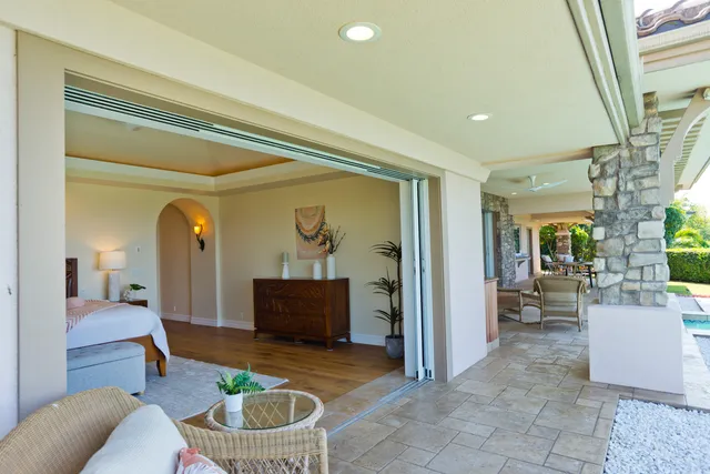 a living room with furniture and a table