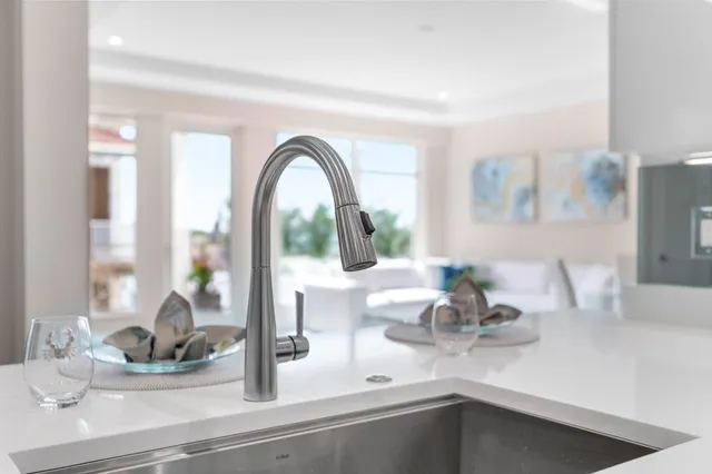 a bathroom with a toilet and a mirror