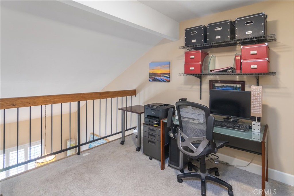 24831 Apple Street, Unit B Newhall, CA 91321 - Photo 23 of 37 a view of a workspace with furniture