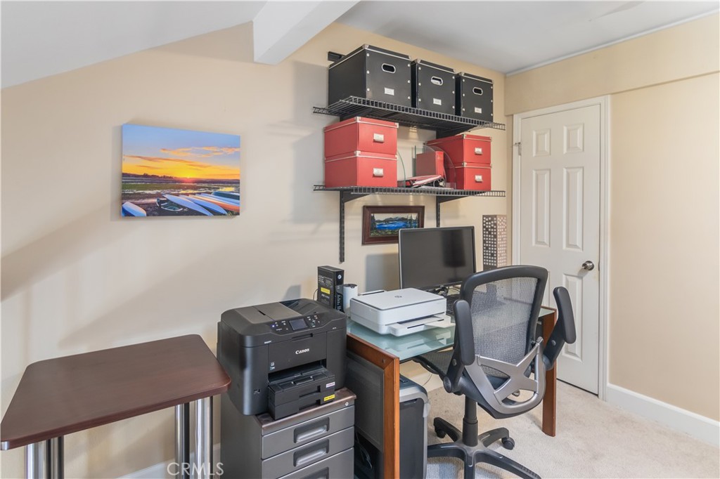 24831 Apple Street, Unit B Newhall, CA 91321 - Photo 24 of 37 a view of a workspace with furniture