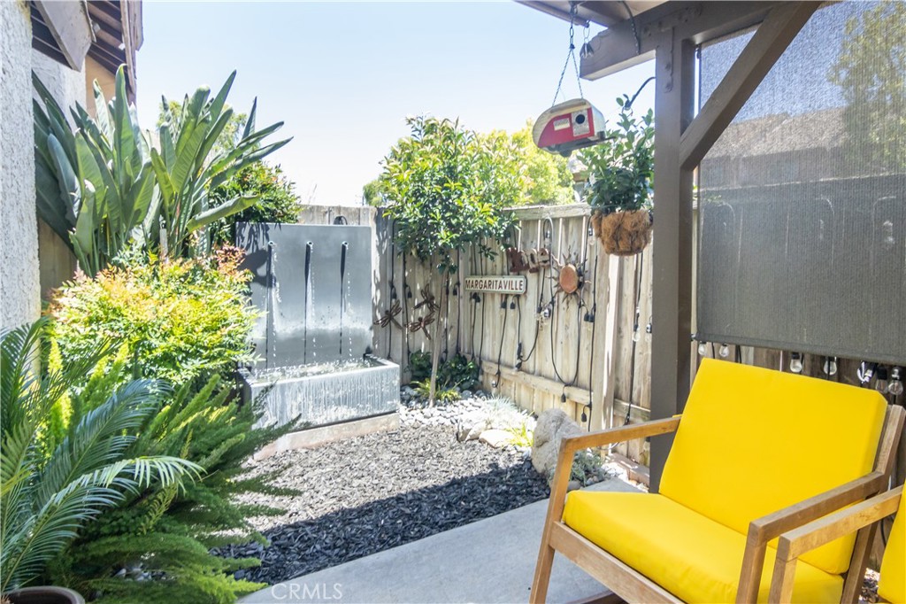 24831 Apple Street, Unit B Newhall, CA 91321 - Photo 26 of 37 a view of a backyard with plants and garden
