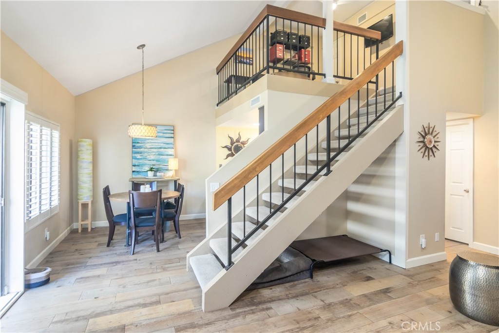 24831 Apple Street, Unit B Newhall, CA 91321 - Photo 5 of 37 a view of entryway and hall with wooden floor