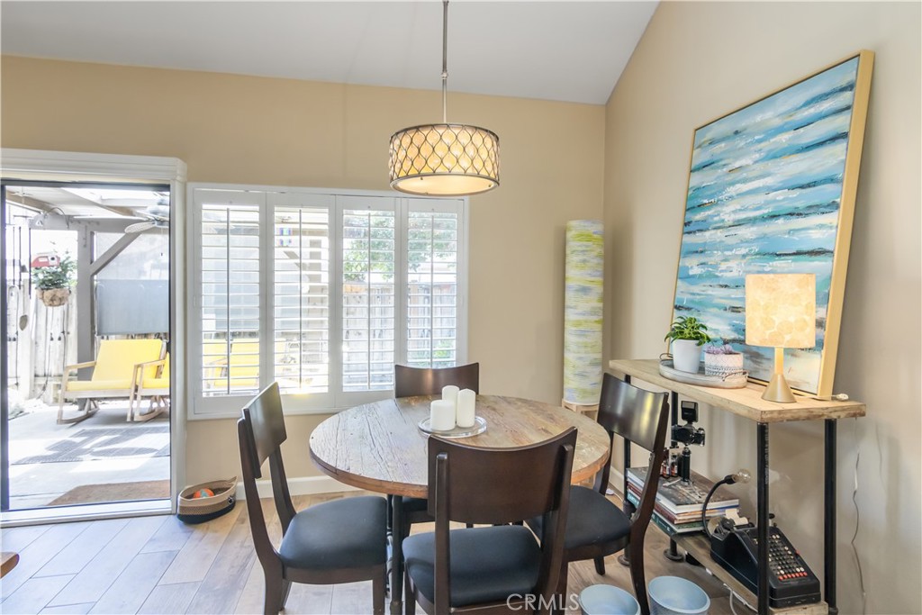 24831 Apple Street, Unit B Newhall, CA 91321 - Photo 8 of 37 a view of a dining room with furniture window and outside view