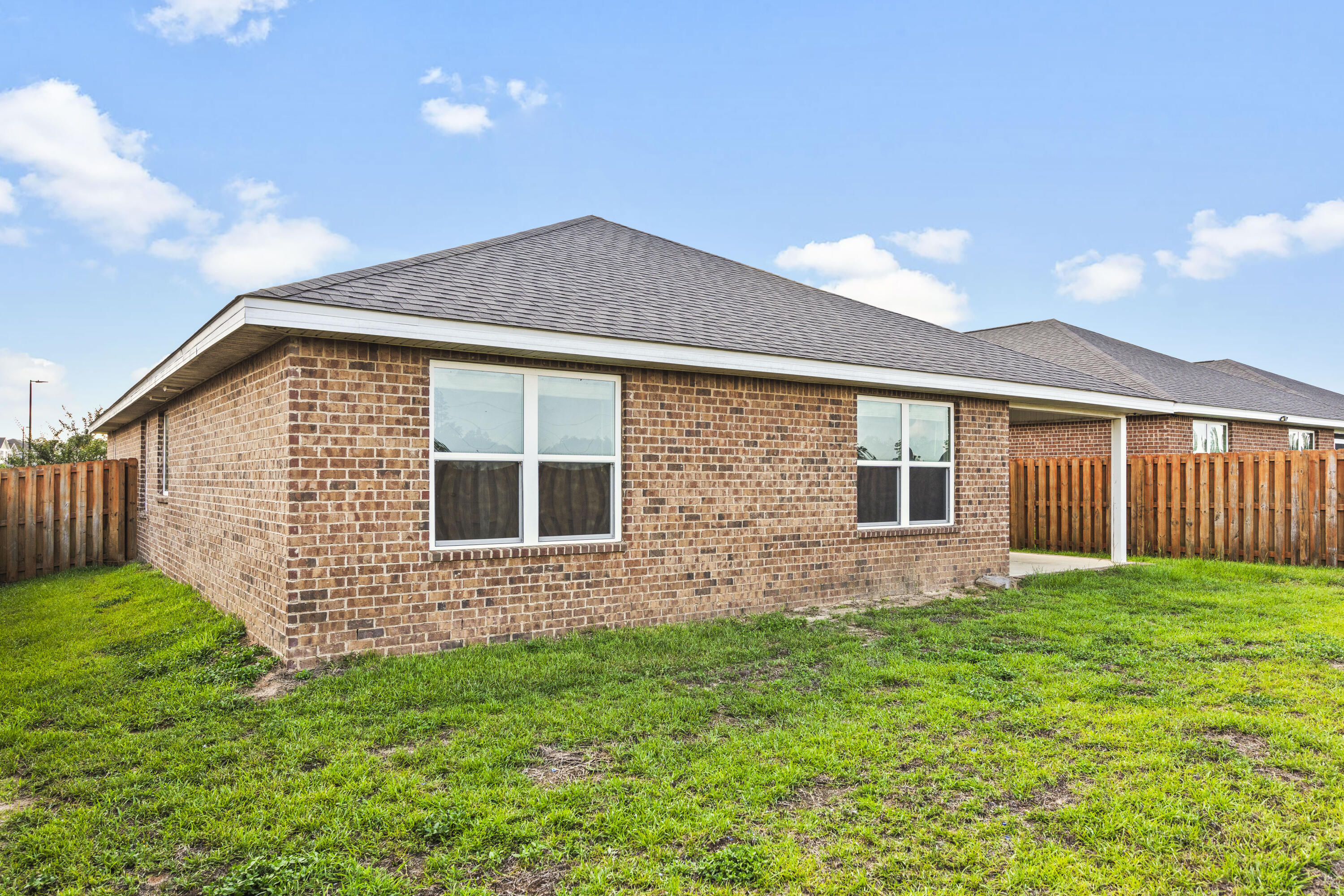 505 Merganser Way Crestview, FL 32539 - Photo 39 of 43 a front view of a house with a yard