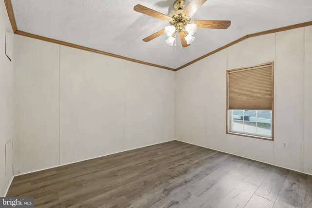 a view of a patio with iron fence