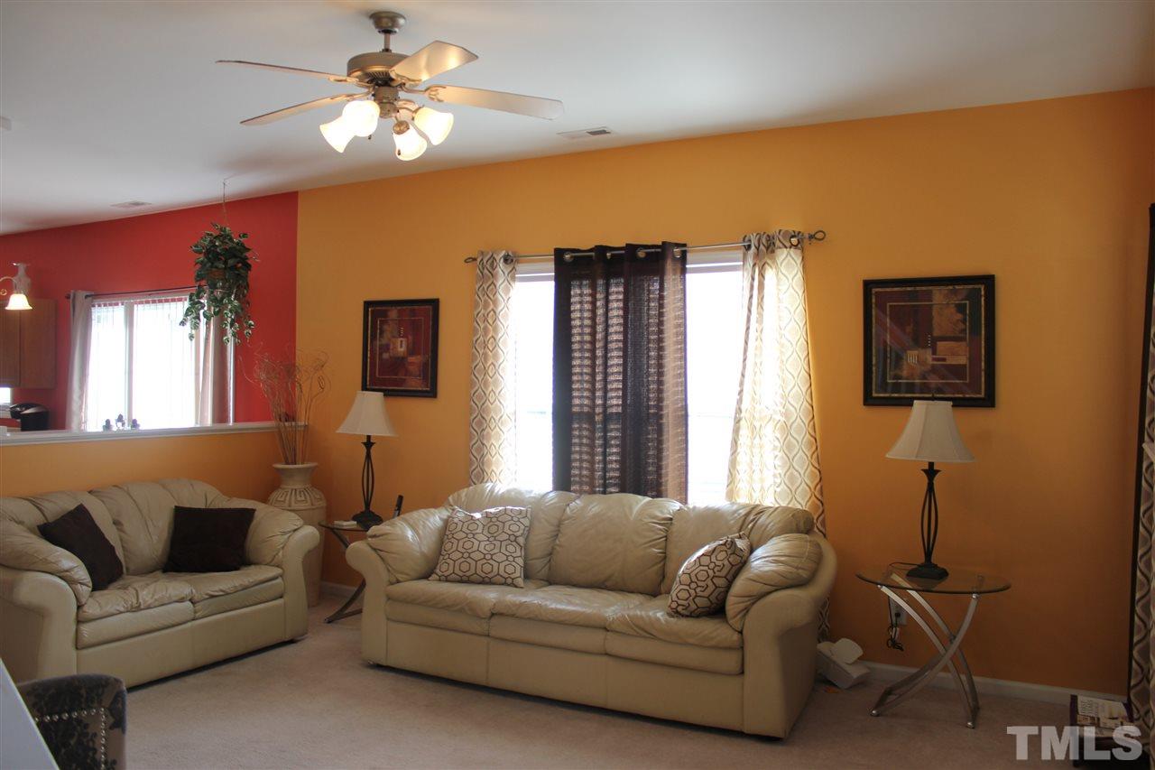 3134 Rendezvous Drive Raleigh, NC 27610 - Photo 8 of 20 a living room with furniture and a window