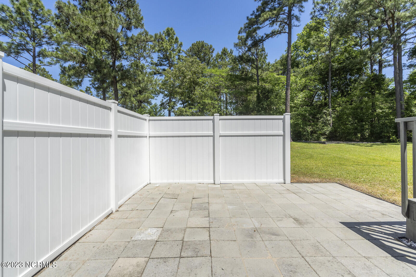 113 Stone Creek Road Holly Ridge, NC 28445 - Photo 40 of 63 Back Deck and Paver Patio
