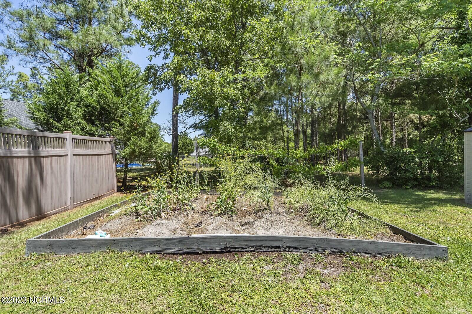 113 Stone Creek Road Holly Ridge, NC 28445 - Photo 46 of 63 Garden Area