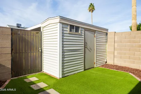 a view of a backyard with a garden