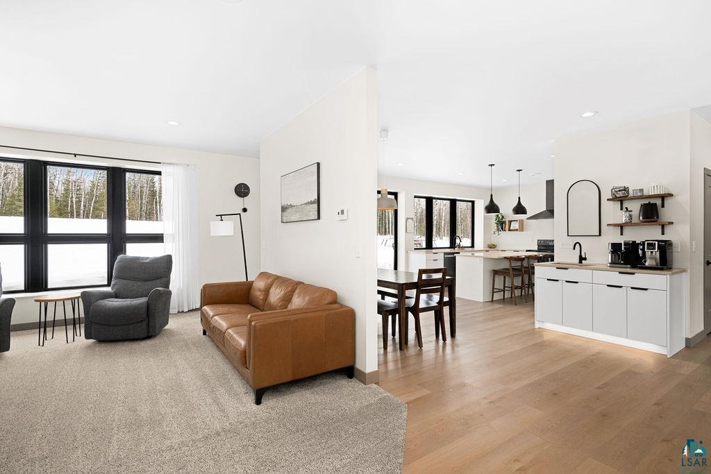1491 Wildwood Road Duluth, MN 55804 - Photo 15 of 38 Living area with light wood finished floors and recessed lighting