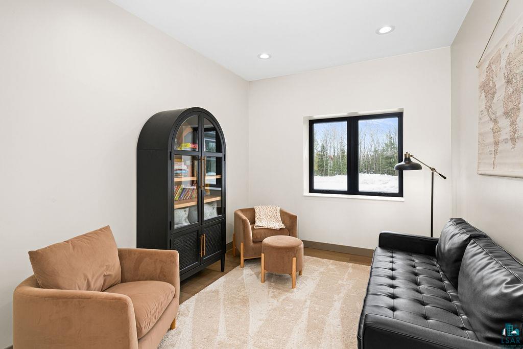 1491 Wildwood Road Duluth, MN 55804 - Photo 18 of 38 Sitting room with wood finished floors and recessed lighting