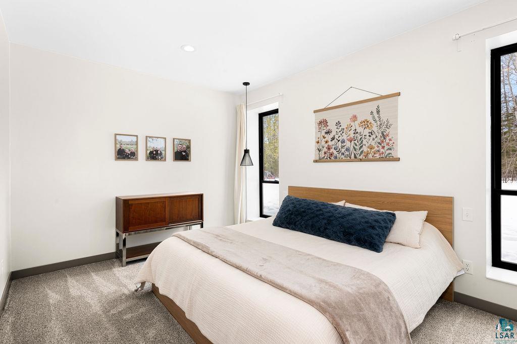 1491 Wildwood Road Duluth, MN 55804 - Photo 20 of 38 Master & spacious main floor master bedroom w/comfortable in floor heat.