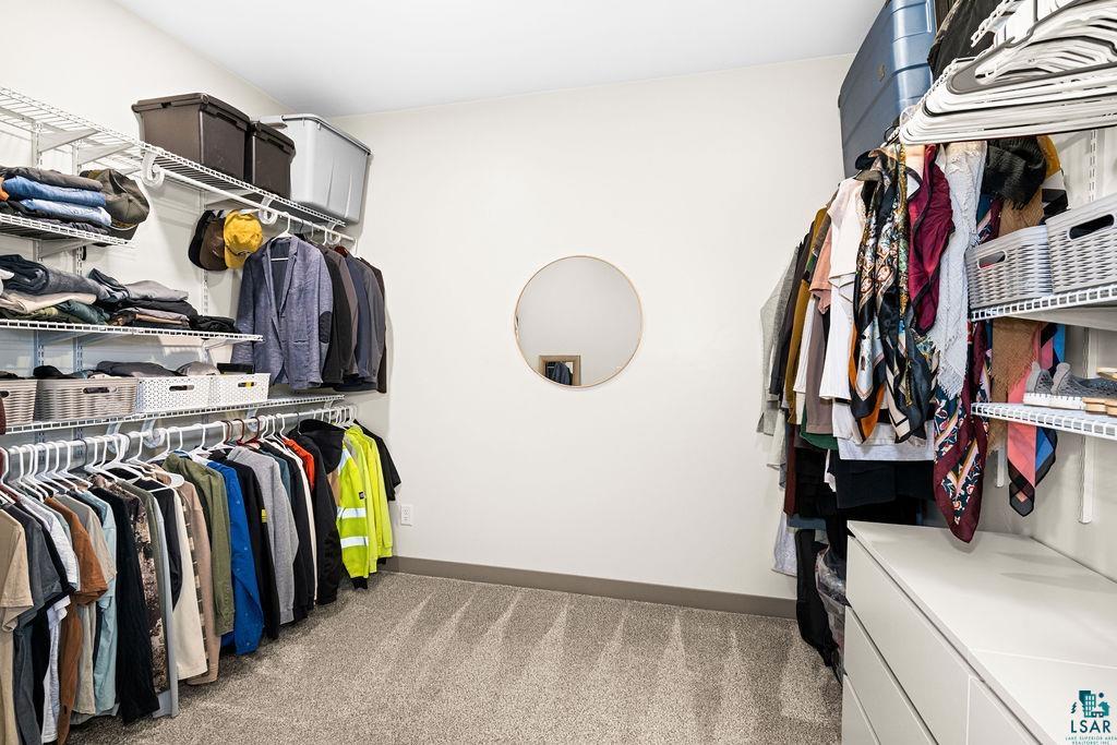 1491 Wildwood Road Duluth, MN 55804 - Photo 24 of 38 Walk in closet with light colored carpet.