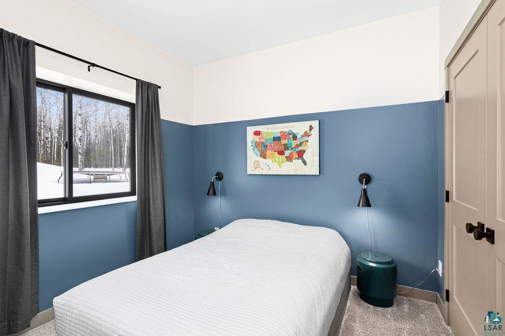 1491 Wildwood Road Duluth, MN 55804 - Photo 26 of 38 9 foot high ceilings, deep window sill & comfortable in floor heat w/carpeting.