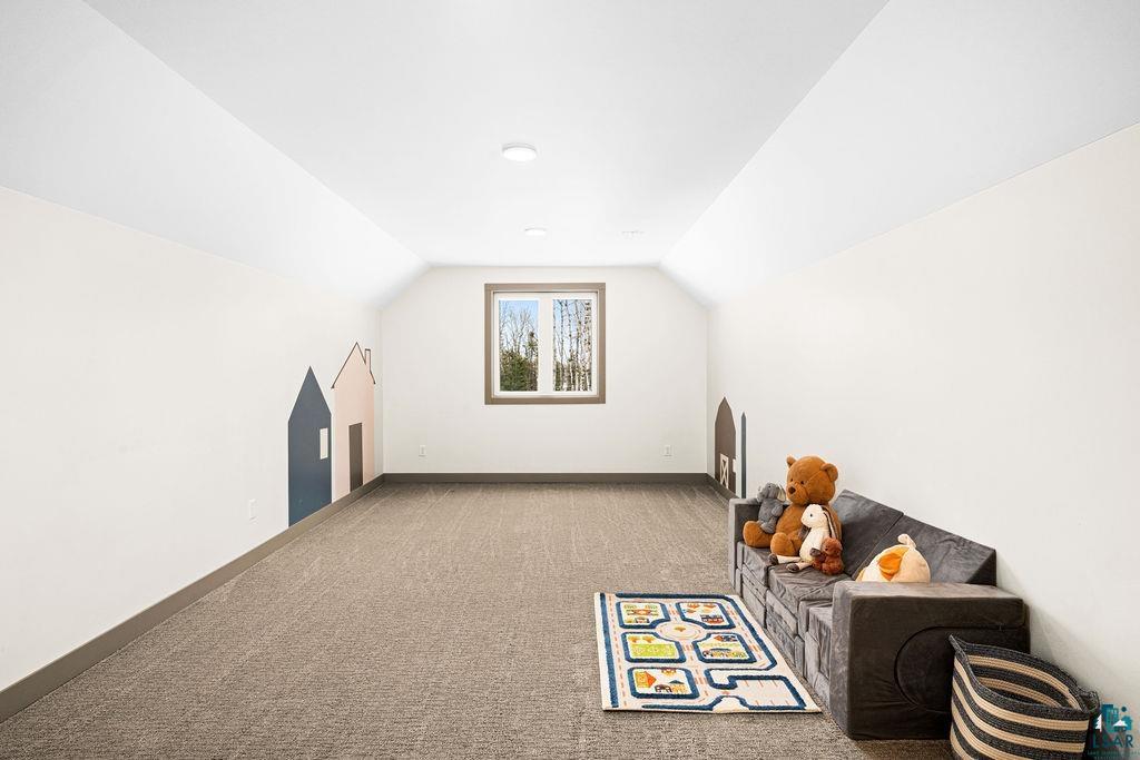 1491 Wildwood Road Duluth, MN 55804 - Photo 33 of 38 Bonus room featuring carpet & access to potential extra that could be finished living space.