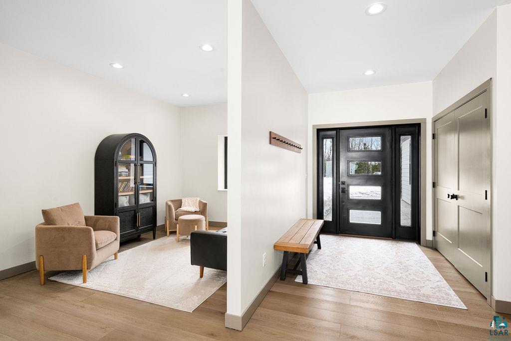 1491 Wildwood Road Duluth, MN 55804 - Photo 7 of 38 Entryway featuring light wood-style flooring and recessed lighting