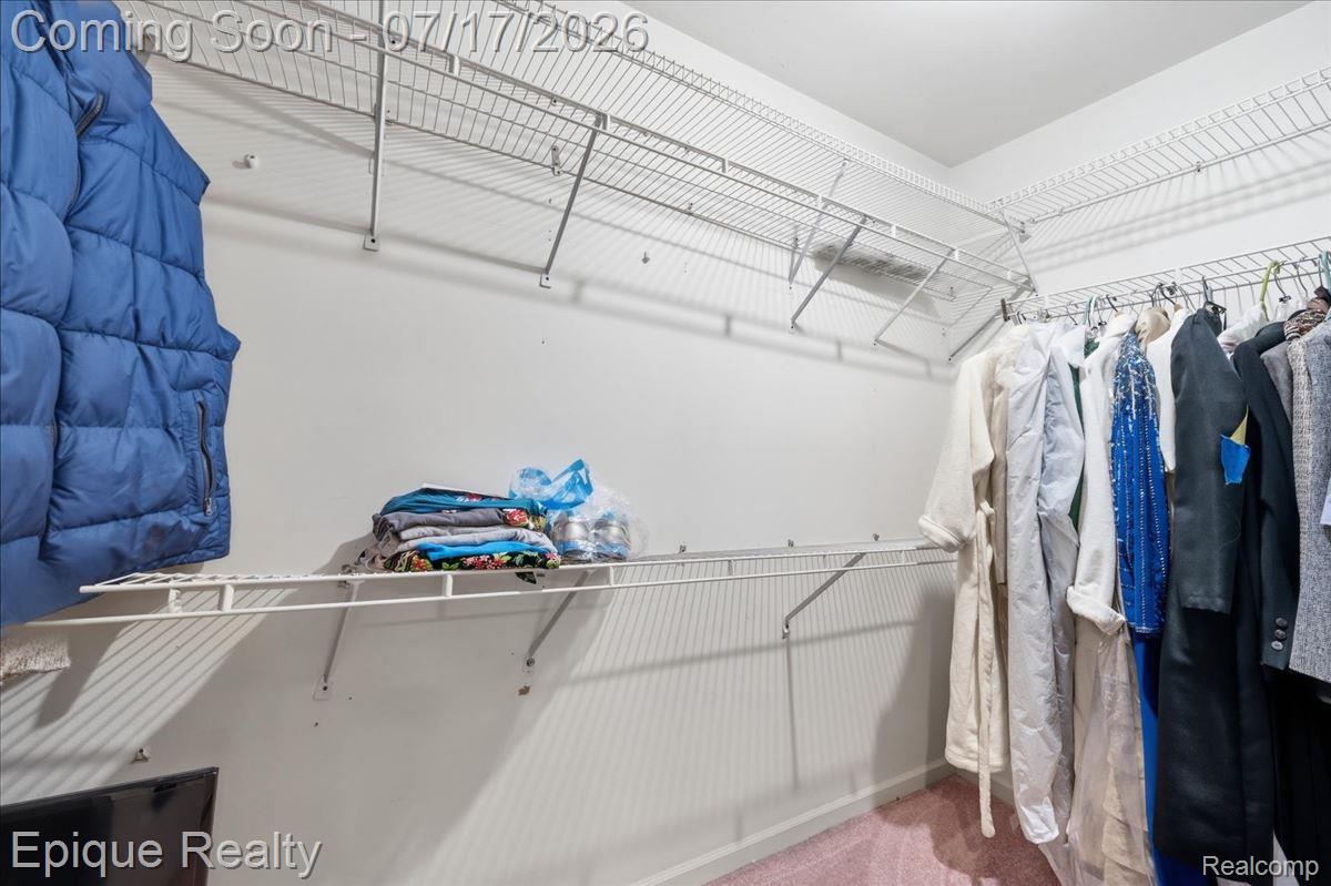 22520 Waltz Road New Boston, MI 48164 - Photo 31 of 43 White wire shelving system with multiple tiers, offering extensive storage capacity