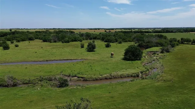 a view of a lush green field