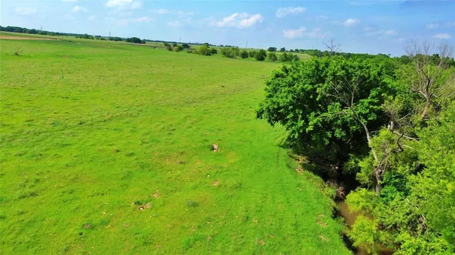 a view of yard with swimming pool and outdoor seating