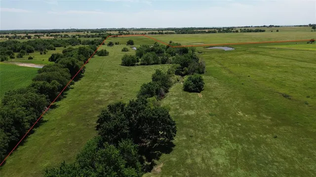 a view of a lake with a city