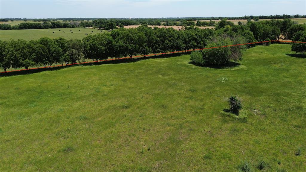 0 County Road 366 Era, TX 76238 - Photo 6 of 22 a backyard of a house with lots of green space and lake view