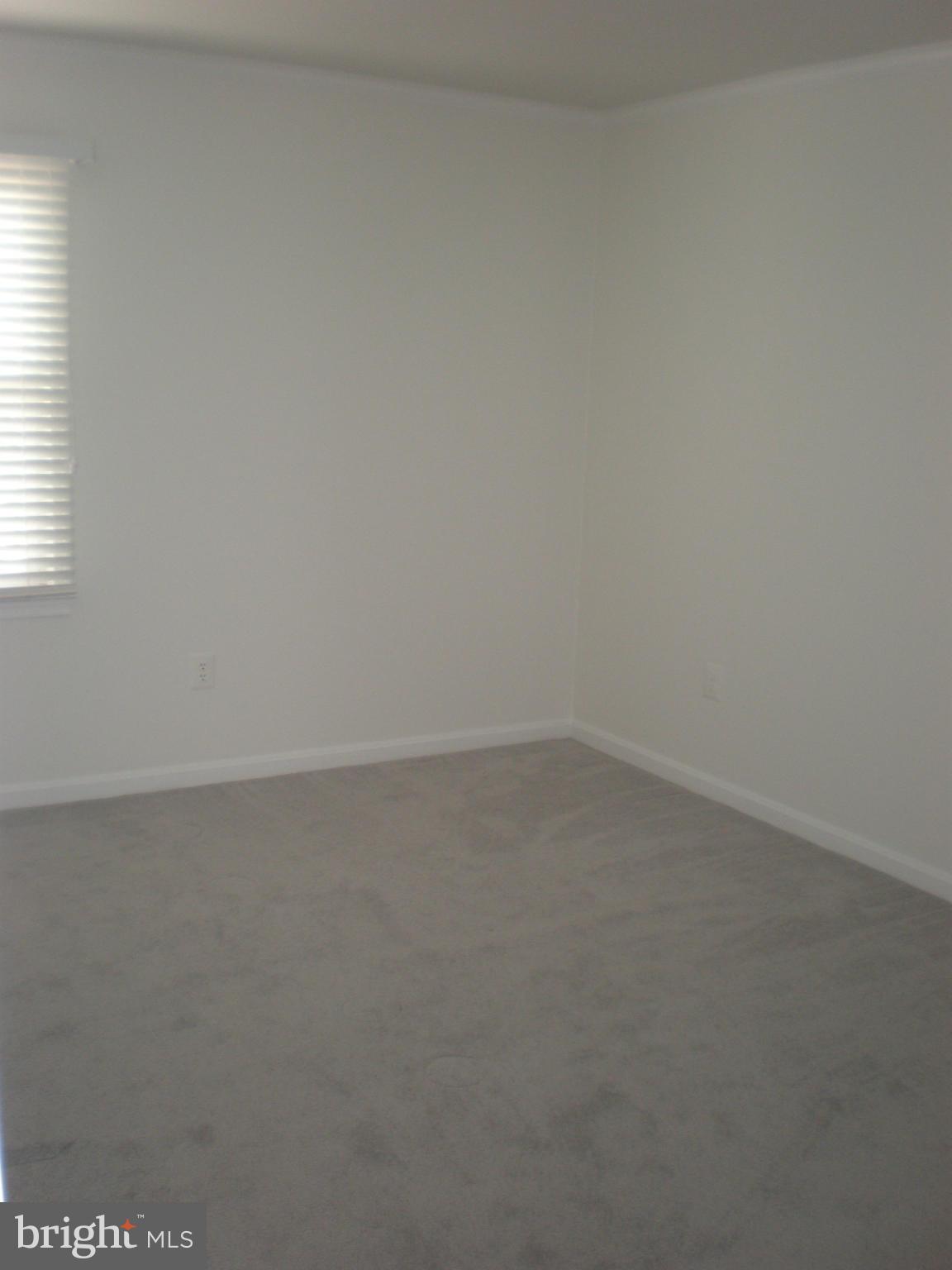 10412 Mountain Quail Road Silver Spring, MD 20901 - Photo 15 of 30 Large Bedroom # 2 at the top of the stairs