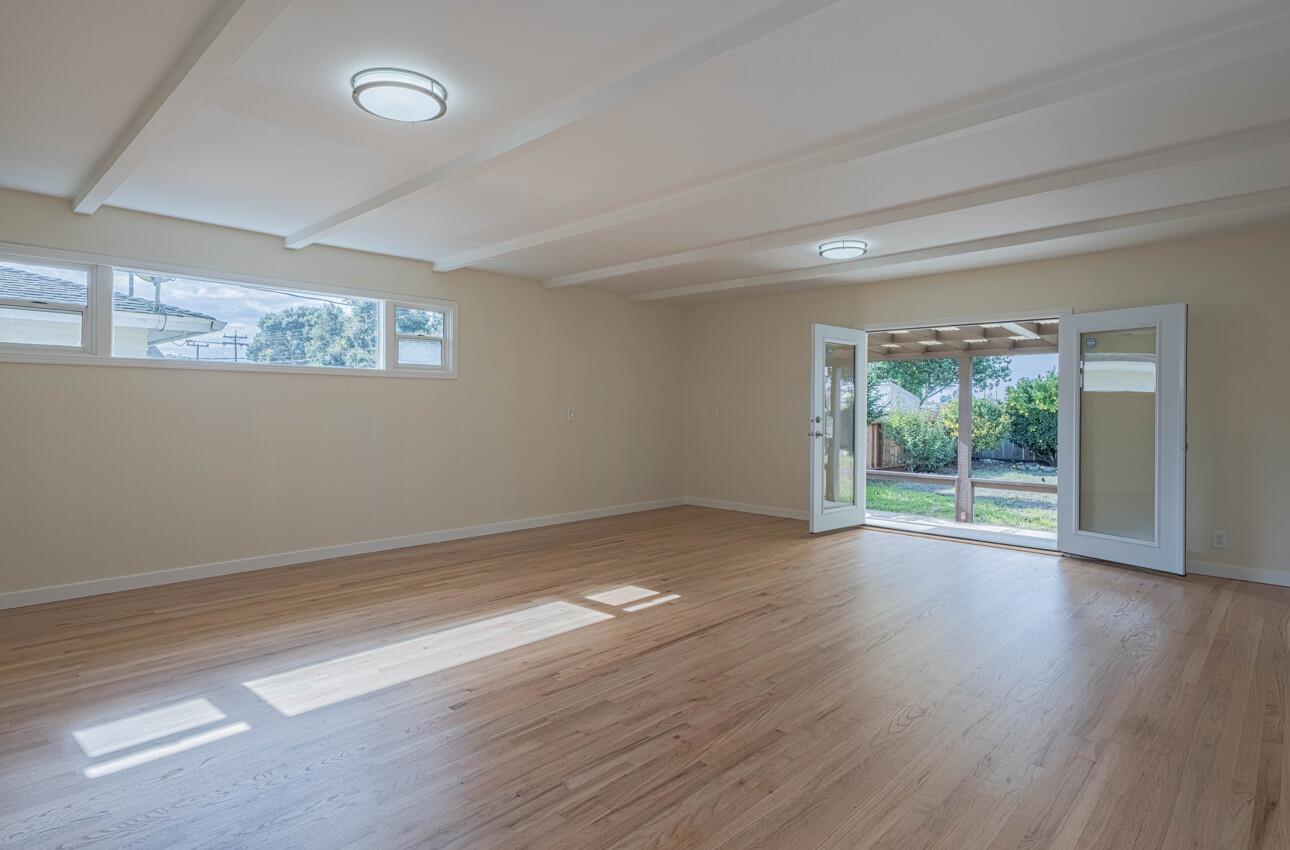 1221 Parkside Street Salinas, CA 93906 - Photo 15 of 41 a view of a room with wooden floor and window