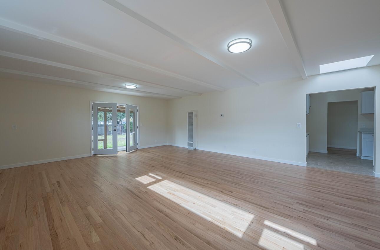 1221 Parkside Street Salinas, CA 93906 - Photo 16 of 41 wooden floor in an empty room with a window