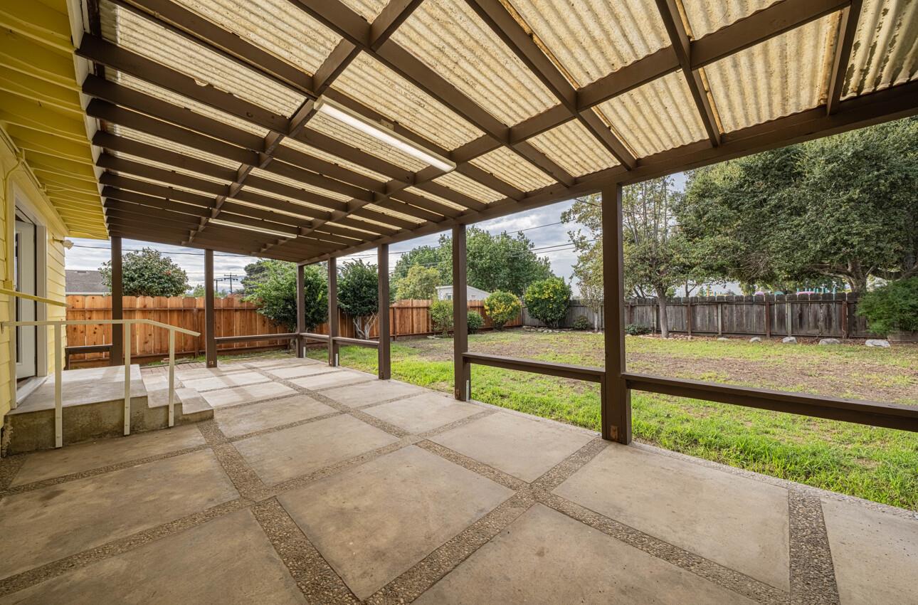 1221 Parkside Street Salinas, CA 93906 - Photo 18 of 41 a view of yard with porch and wooden fence