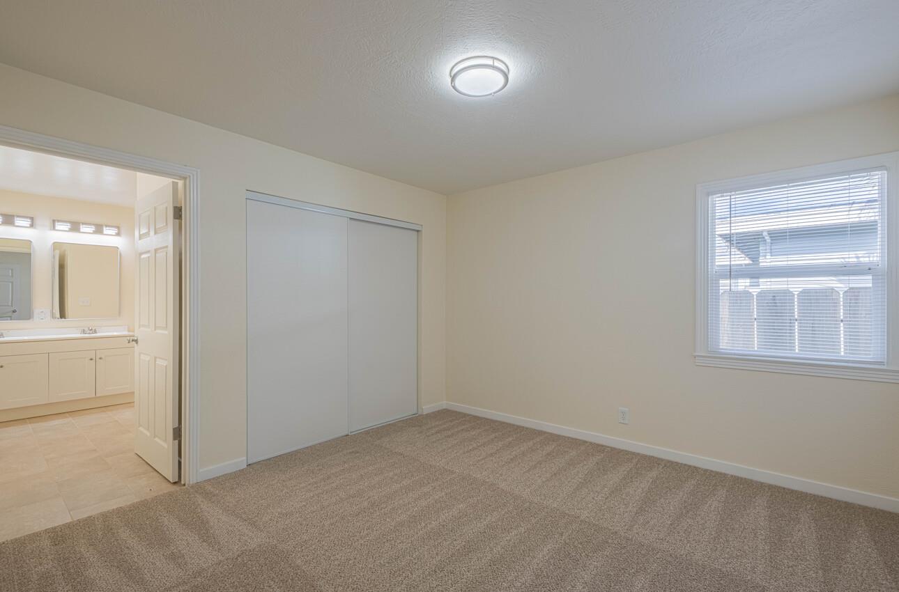 1221 Parkside Street Salinas, CA 93906 - Photo 22 of 41 an empty room with windows and closet