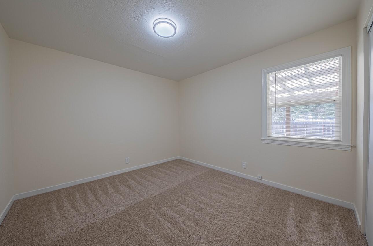 1221 Parkside Street Salinas, CA 93906 - Photo 28 of 41 an empty room with a window