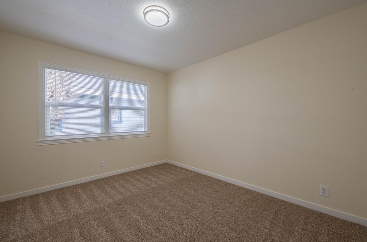 1221 Parkside Street Salinas, CA 93906 - Photo 30 of 41 an empty room with a window
