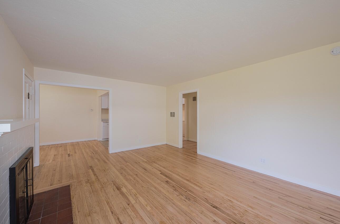 1221 Parkside Street Salinas, CA 93906 - Photo 8 of 41 a view of an empty room with wooden floor