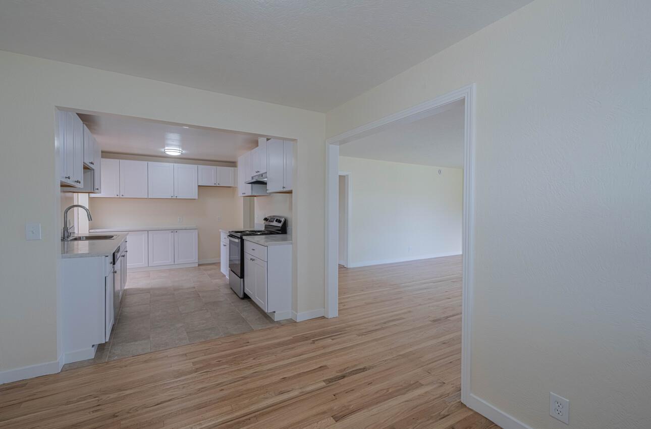 1221 Parkside Street Salinas, CA 93906 - Photo 10 of 41 a view of kitchen with wooden floor