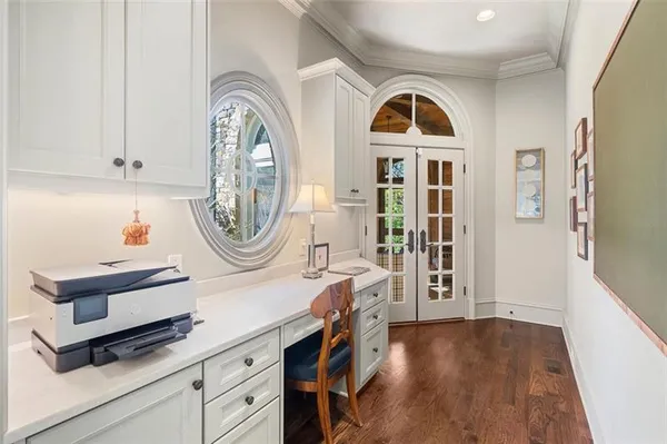 a bathroom with a toilet a sink and a mirror