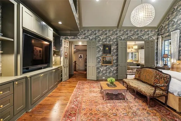 a view of workspace with window and couch