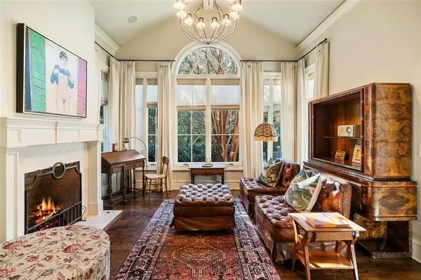 a view of a chairs and a table in the patio