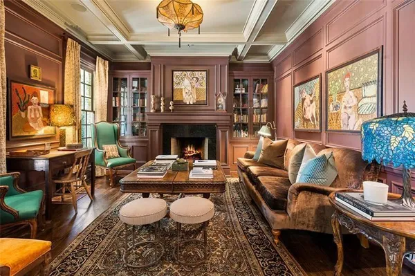 a view of living room with furniture and wooden floor