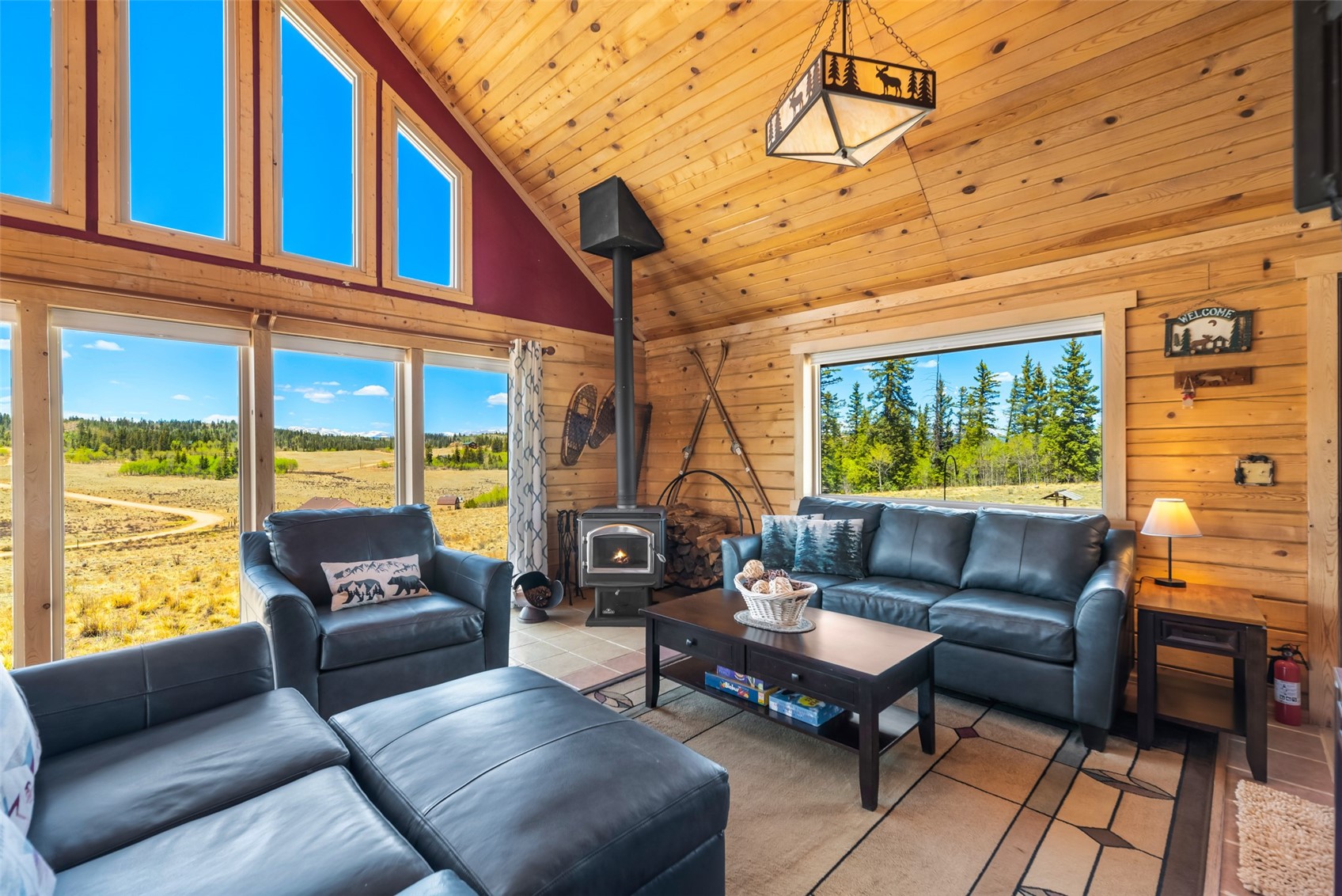 15 Mallard Road Como, CO 80432 - Photo 11 of 49 a living room with furniture and a large window