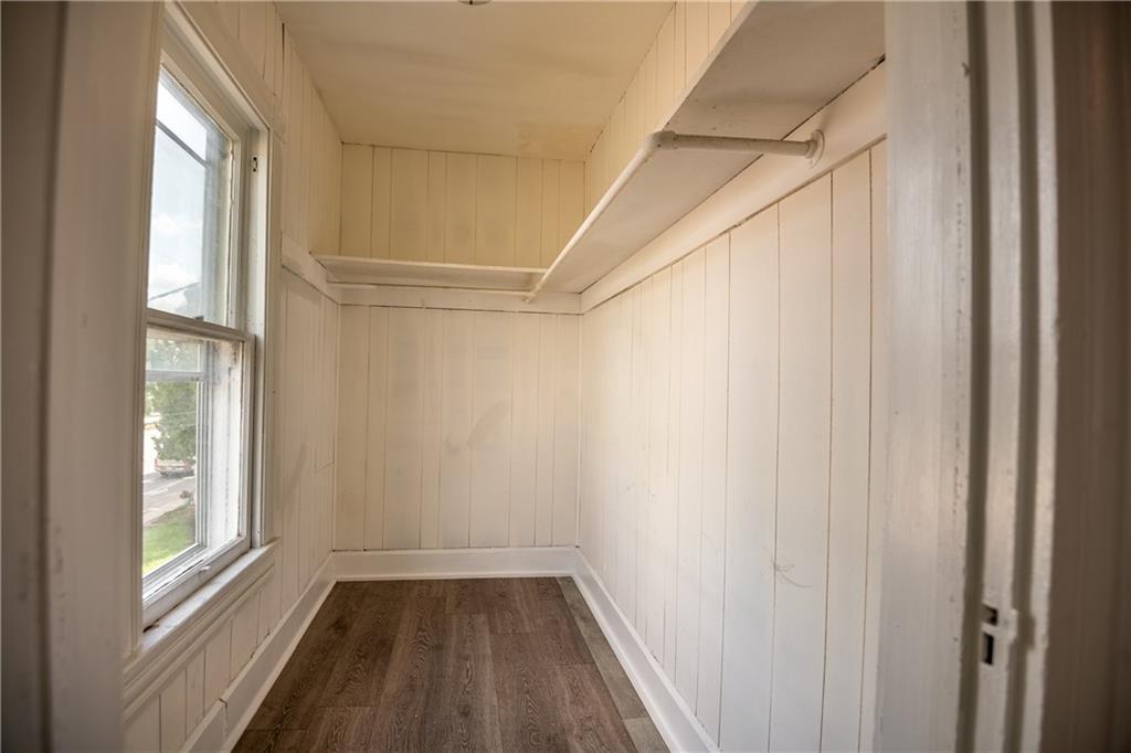 780 South Irvine Avenue, Unit 1 Sharon, PA 16146 - Photo 8 of 10 a view of a room with a window and a ceiling fan