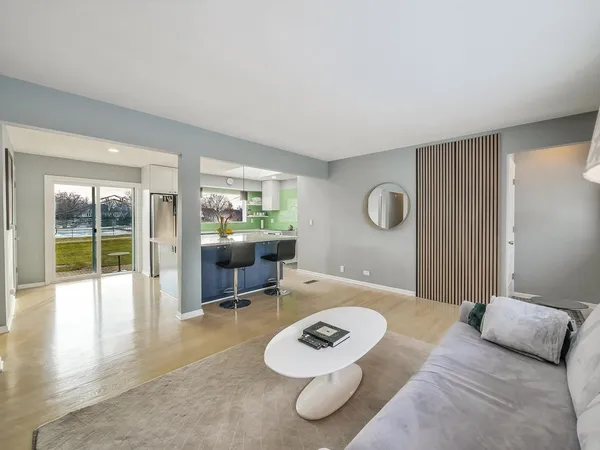 a living room with furniture and a table