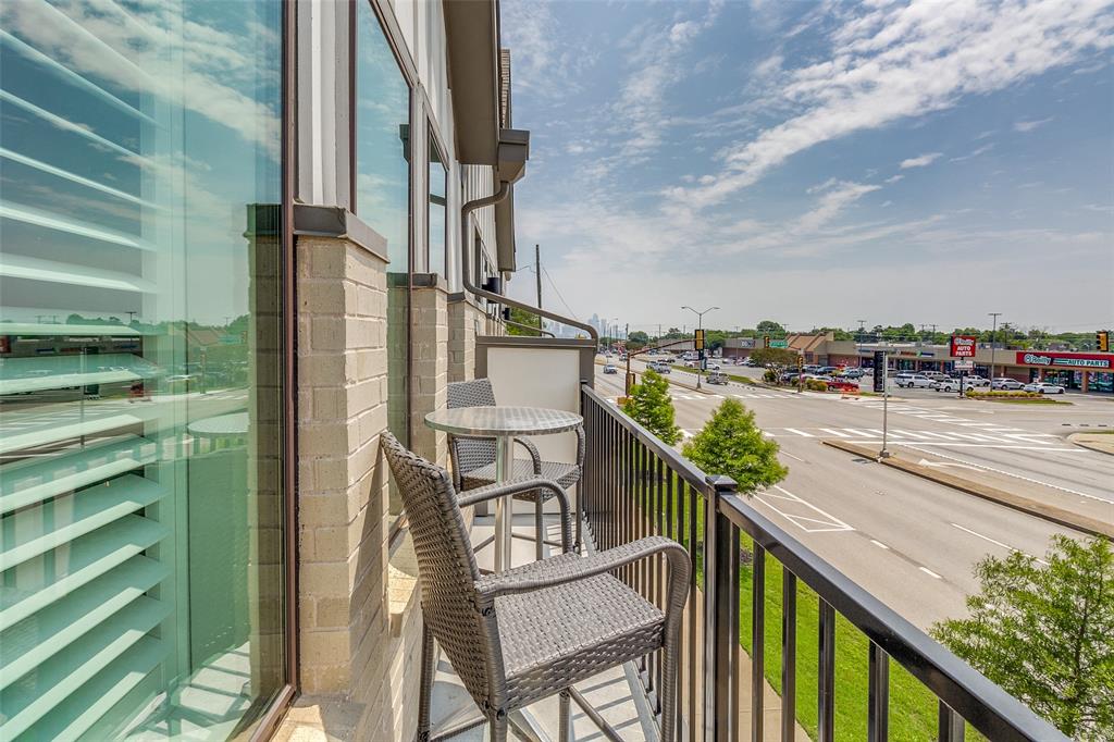 2220 Rook Drive Dallas, TX 75211 - Photo 13 of 13 a balcony view with two chairs and a table