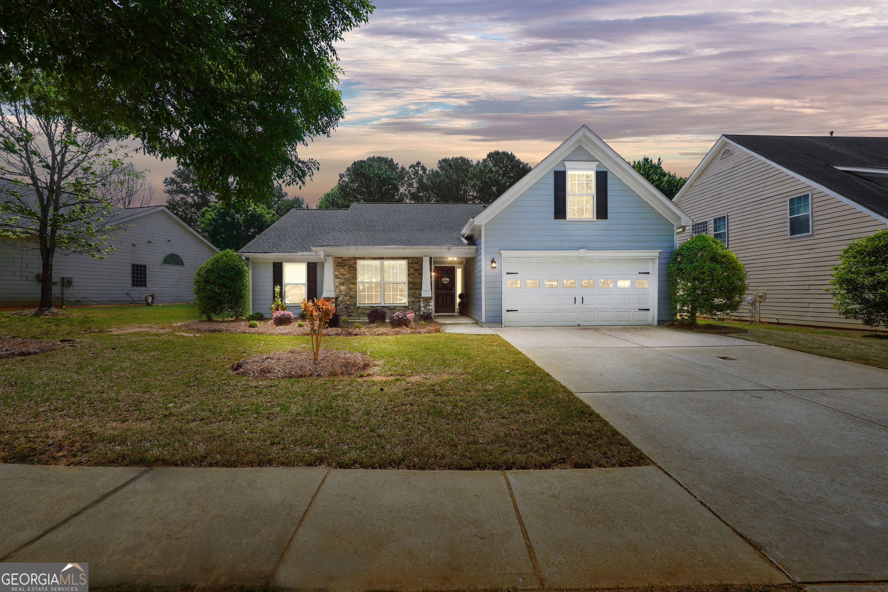 164 Lantana Drive Locust Grove, GA 30248 - Photo 1 of 34 a front view of a house with a yard