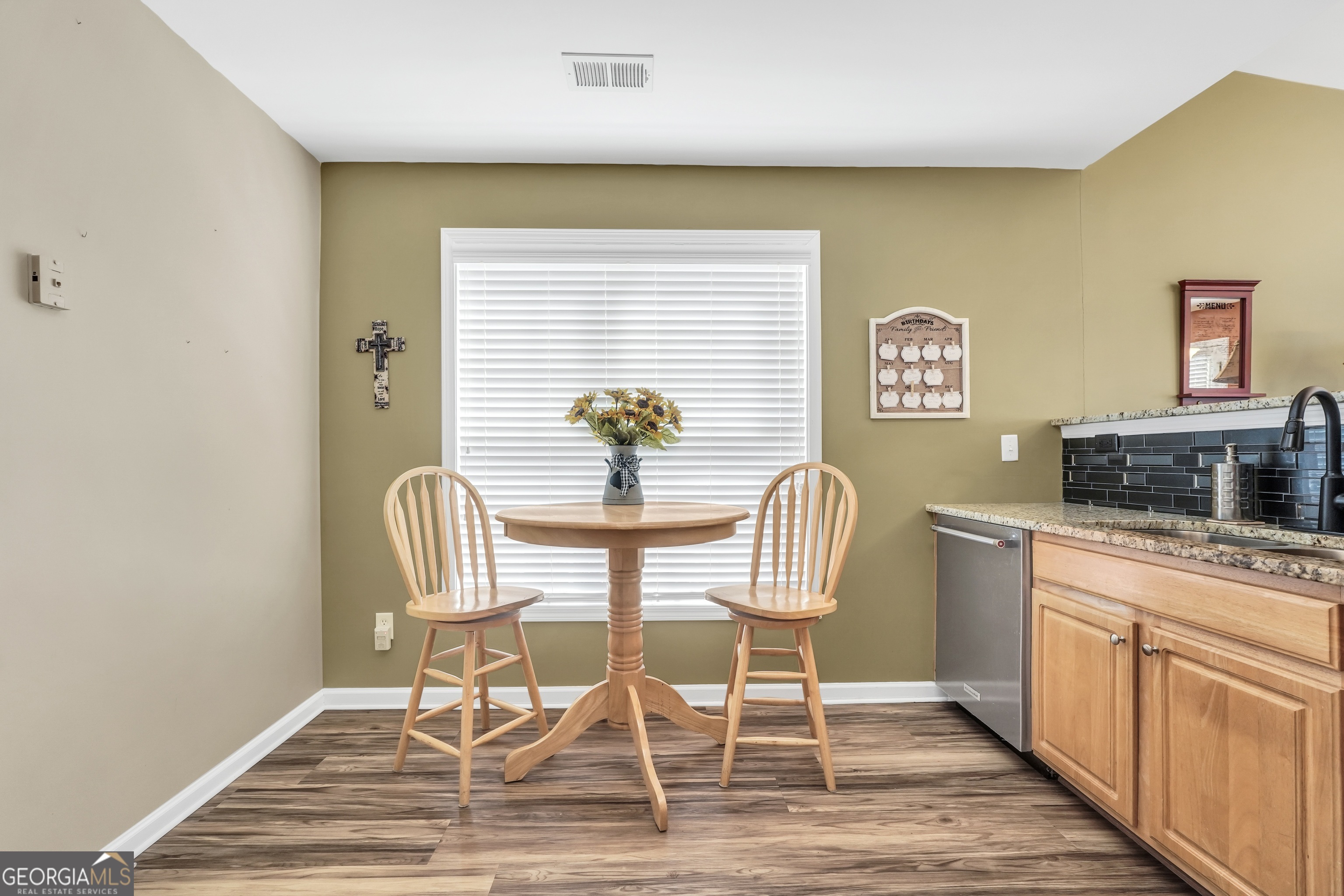 164 Lantana Drive Locust Grove, GA 30248 - Photo 15 of 34 a chair and a table in a room