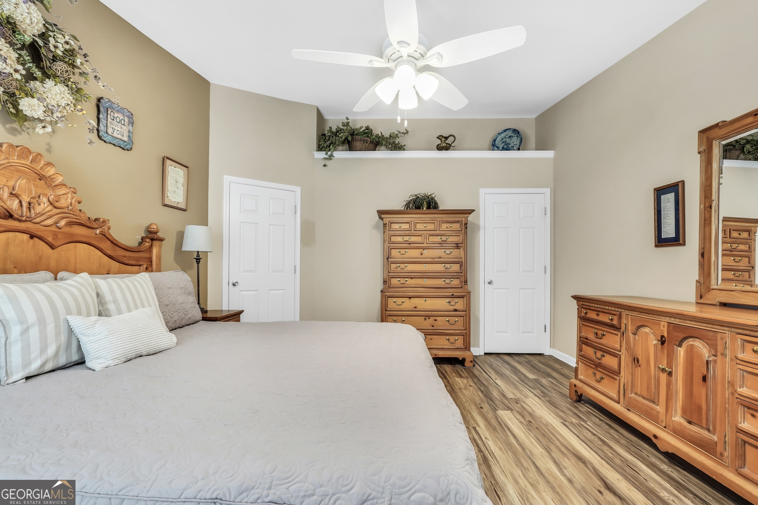 164 Lantana Drive Locust Grove, GA 30248 - Photo 18 of 34 a bedroom with a bed and dresser