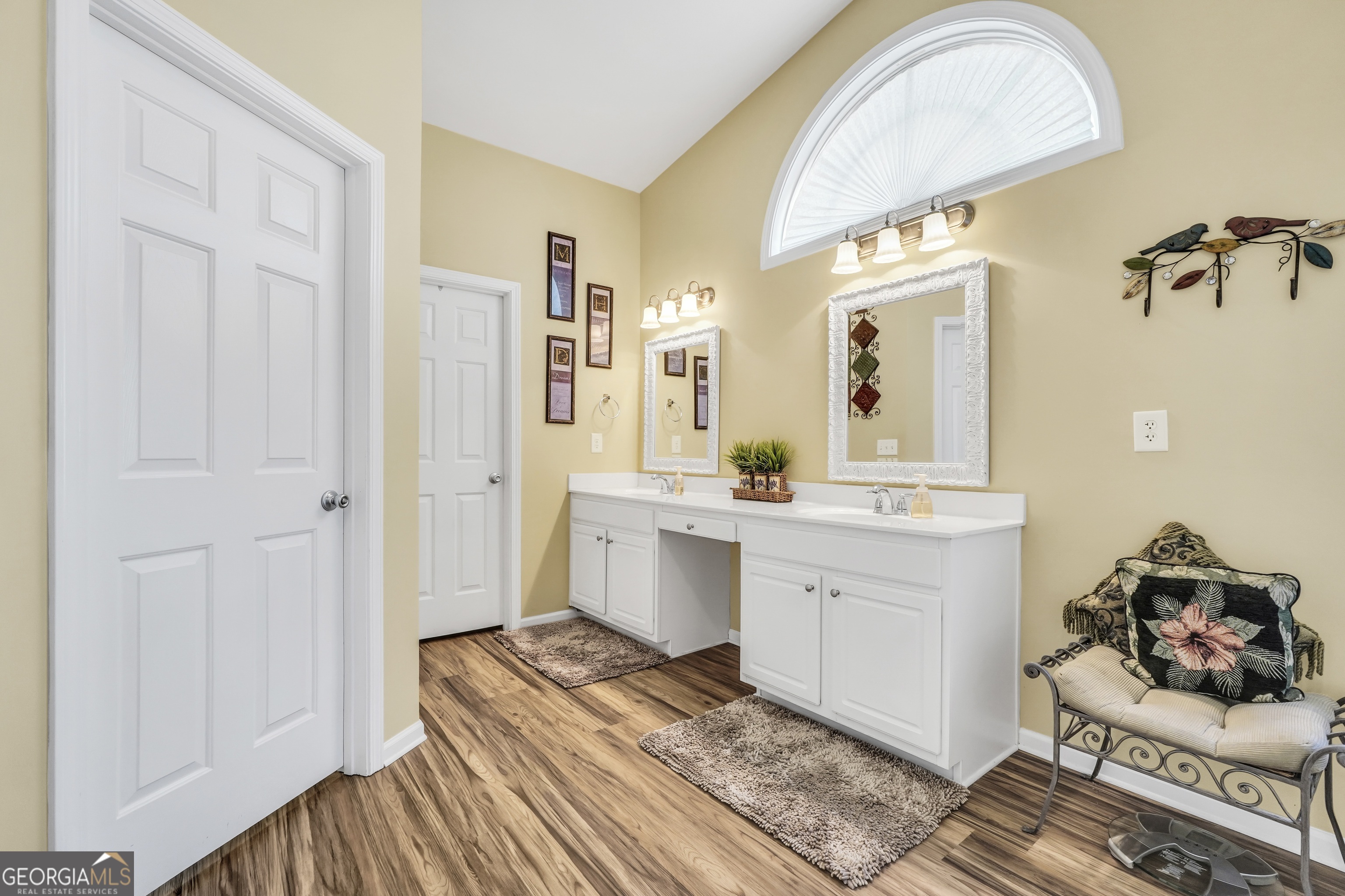 164 Lantana Drive Locust Grove, GA 30248 - Photo 20 of 34 a spacious bathroom with a sink mirror and shower