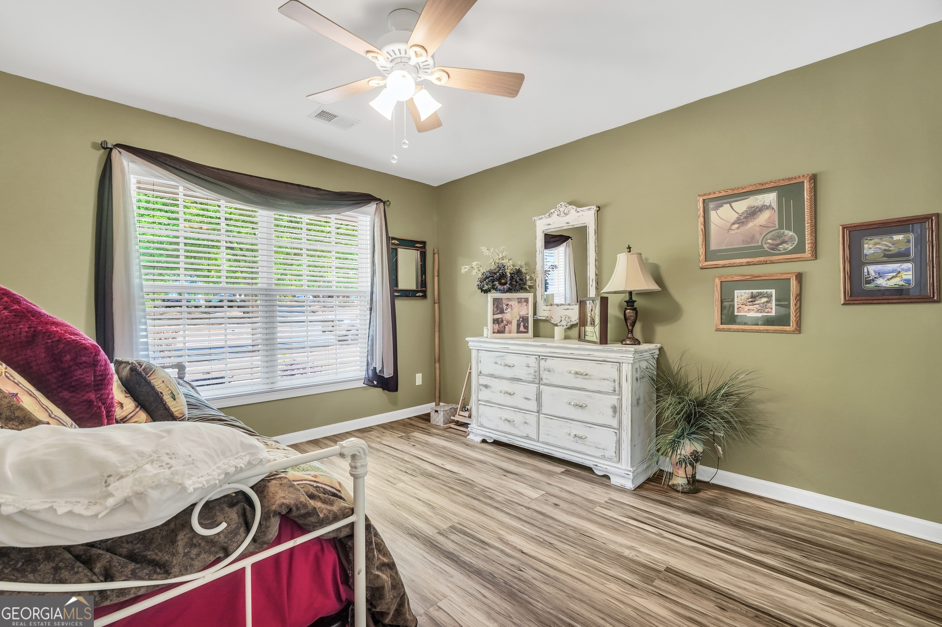 164 Lantana Drive Locust Grove, GA 30248 - Photo 26 of 34 a living room with furniture and a open kitchen view