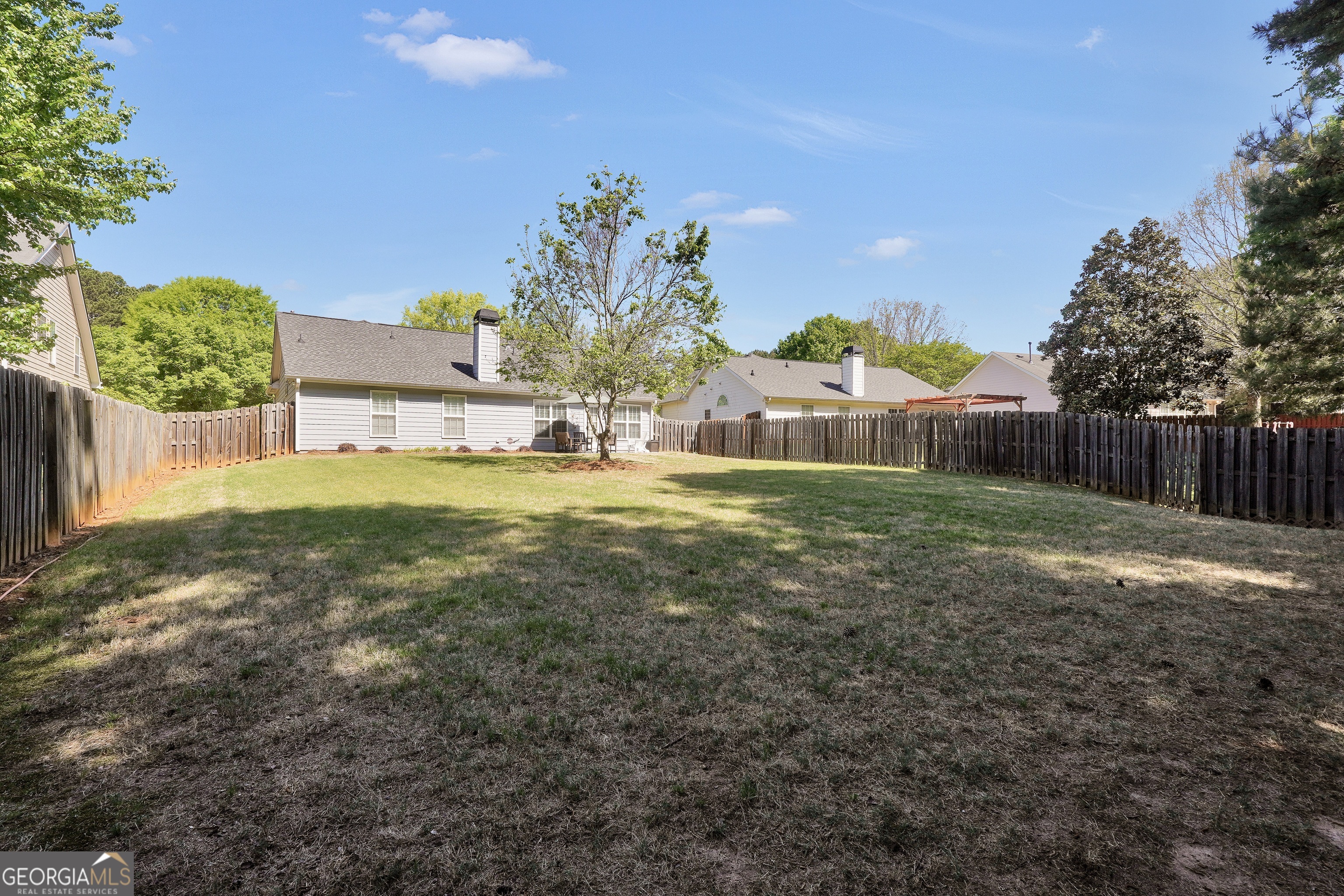 164 Lantana Drive Locust Grove, GA 30248 - Photo 34 of 34 a view of a house with a yard