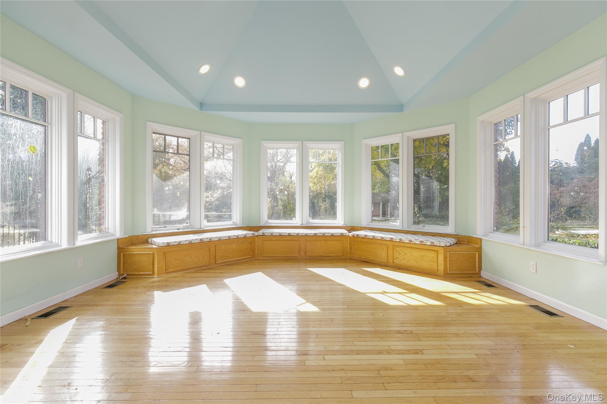 18 Lighthouse Road Kings Point, NY 11024 - Photo 12 of 36 a spacious bathroom with a large tub and large windows