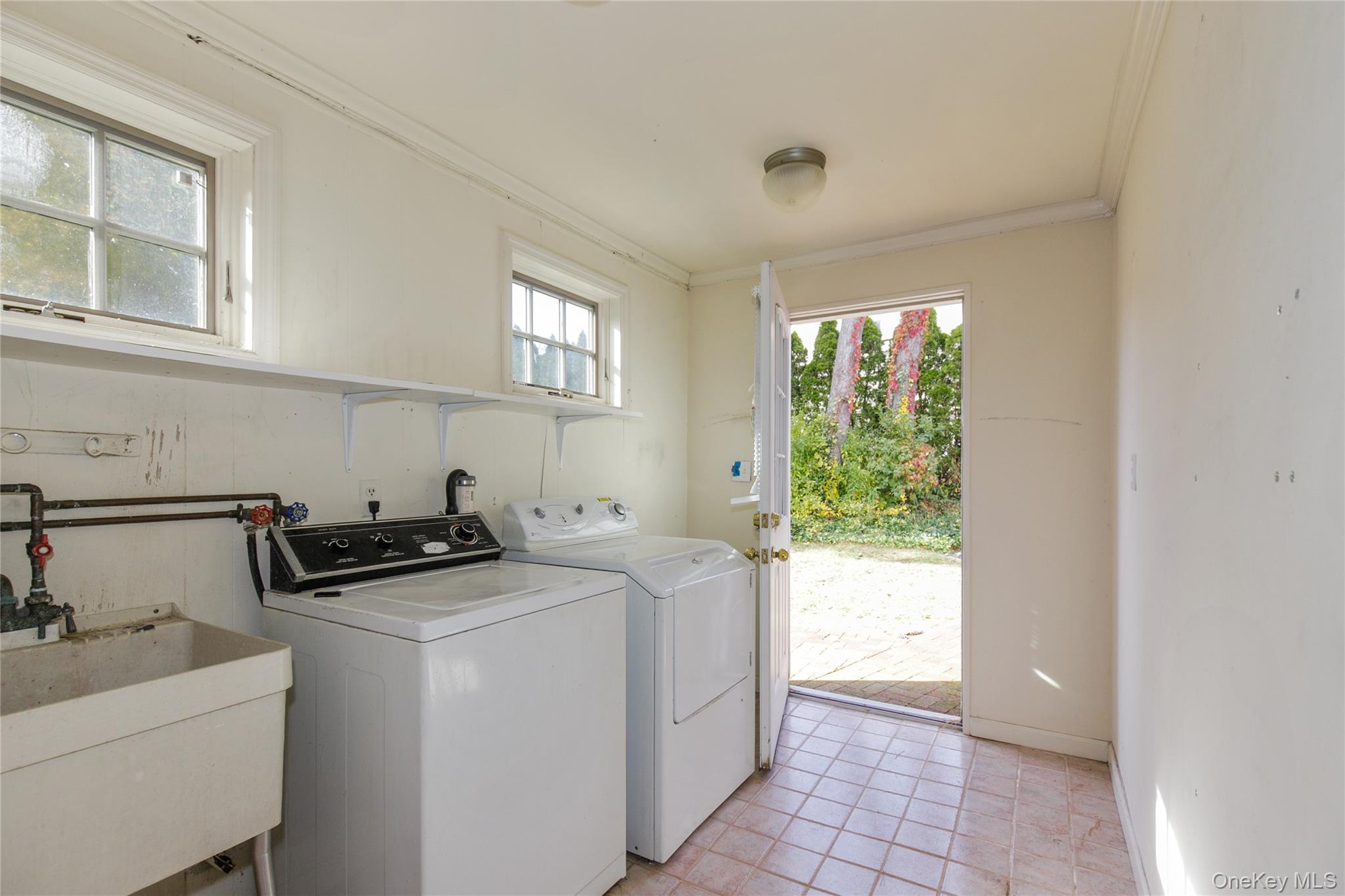 18 Lighthouse Road Kings Point, NY 11024 - Photo 14 of 36 a room with storage and utility